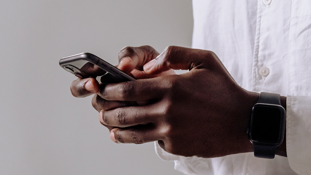 man holding iPhone