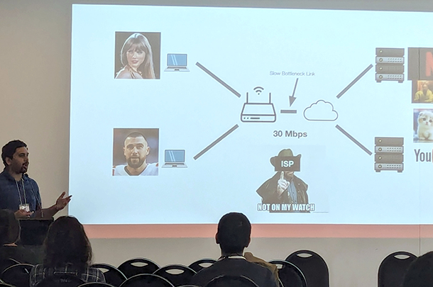 Photo of Adithya Abraham Philip presenting research at ACM SIGCOMM 2024